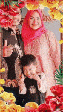 a woman in a pink hijab is standing next to a boy and giving a thumbs up ..
