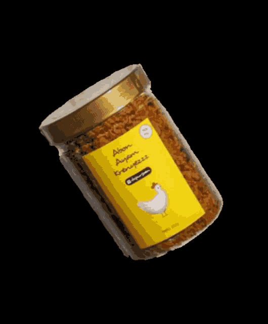 a jar of chicken seasoning has a yellow label with a chicken on it