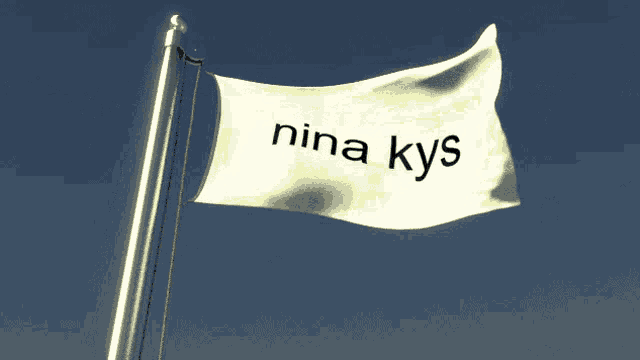 a white flag that says nina kys is flying in the wind