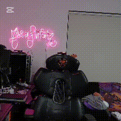 a room with a neon sign that says ' make a twittz '