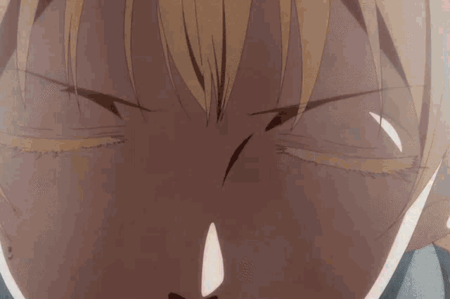 a girl with blonde hair and a pink headband is making an angry face