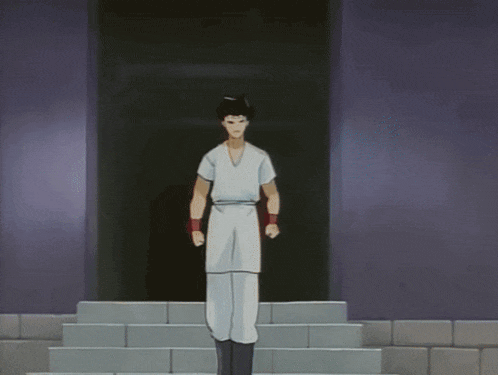 a man in a white shirt and white pants stands on a set of steps