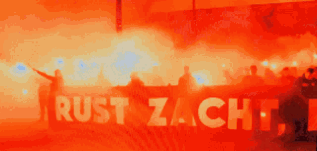 a sign that says rust zacht is lit up in red