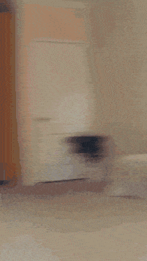 a blurry picture of a person 's face with a red shirt on