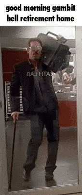 a man with a cane is walking through a door carrying a suitcase .