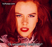 a close up of a woman 's face with the words or smoldering temptress