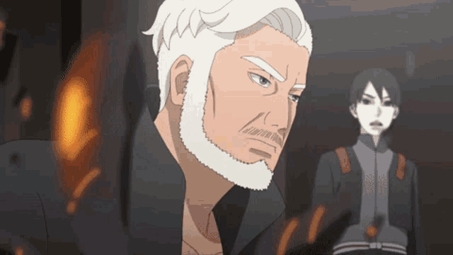 a man with a white beard is standing next to a woman