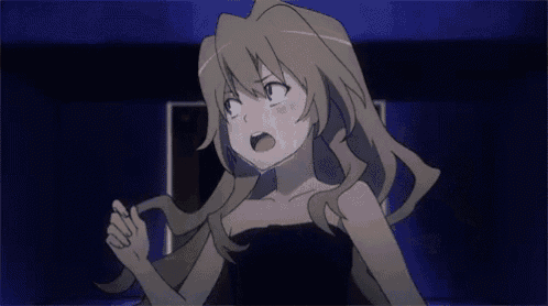 a girl in a black dress is standing in the dark
