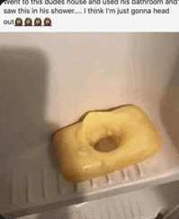 a yellow soap bar with a hole in the middle of it
