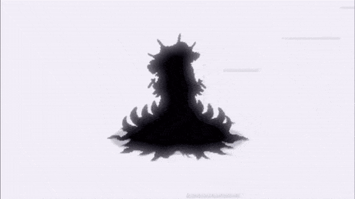 a shadow of a person is being cast on a white surface .