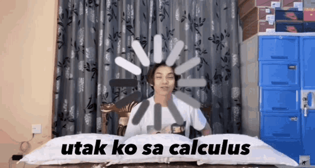 a person sitting on a bed with the words utak ko sa calculus