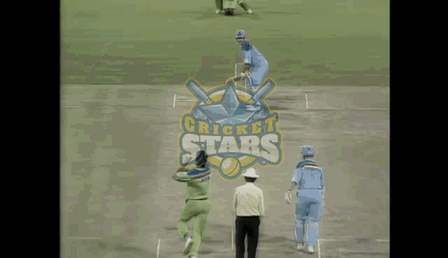 a man wearing a green shirt that says ' cricket stars ' on it