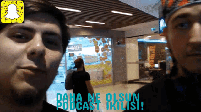 two men standing next to each other with the words daha ne olsun podcast ikilisi