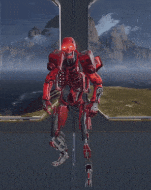 a red robot is standing on a platform in front of mountains