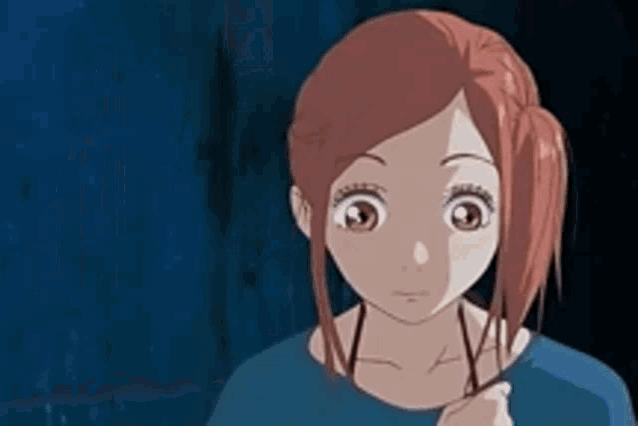 a close up of a cartoon girl with red hair