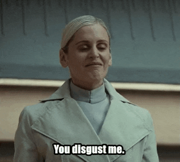 a woman in a white coat is saying you disgust me .