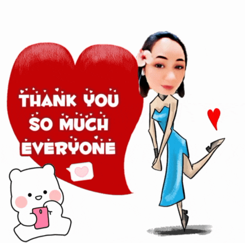 a woman in a blue dress stands in front of a red heart with the words thank you so much everyone written on it