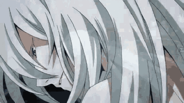 a close up of a person 's head with white hair
