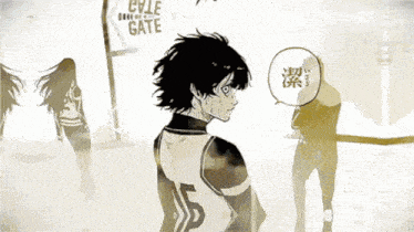 a boy in a number 15 jersey stands in front of a sign that says gate