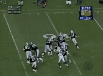 a football game is being played on a field with a scoreboard that says cbs