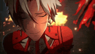 a close up of a person 's face with their eyes closed and a red jacket on .