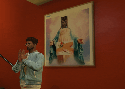 a man stands in front of a framed picture of a woman holding a sandwich with the word terror on it