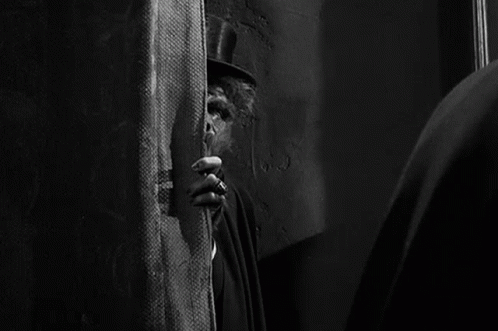 Hiding Boris Karloff GIF - Hiding Boris Karloff Dr Henry Jekyll GIFs