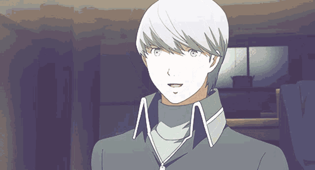 a man with white hair is wearing a turtleneck and a collar with the letter a on it