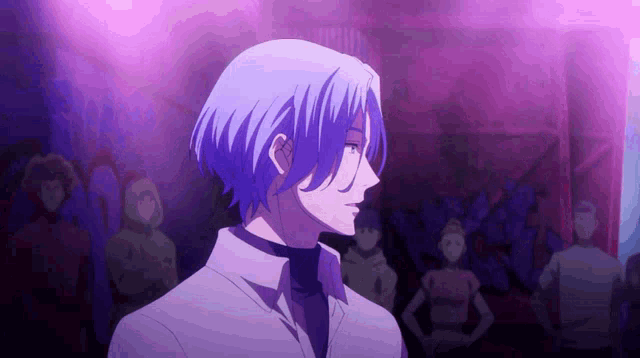 a man with blue hair is standing in front of a crowd of people in a purple room .