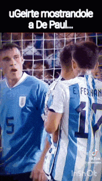 a group of soccer players standing next to each other in front of a goal .