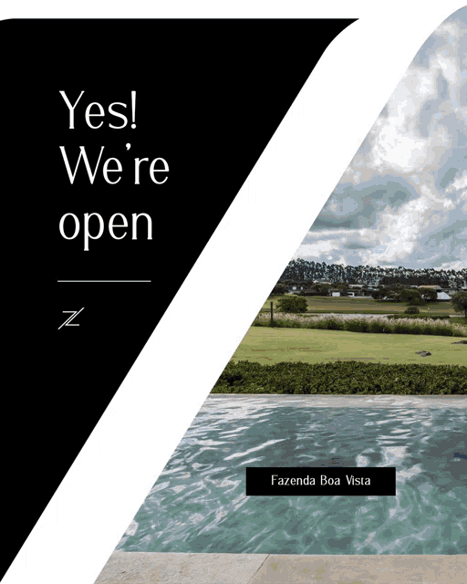 a sign that says yes we 're open with a picture of a swimming pool