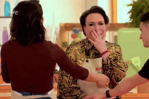 a woman wearing an apron that says ben is covering her mouth