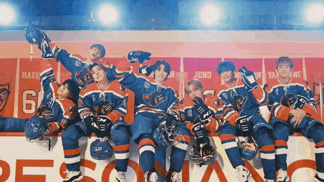 a group of hockey players are posing for a picture with the number 6 on the back