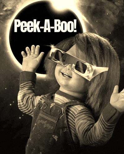 a black and white photo of a doll with the words peek-a-boo on the bottom
