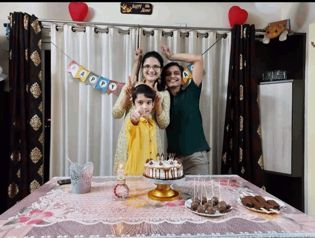 a happy home sign hangs above a table