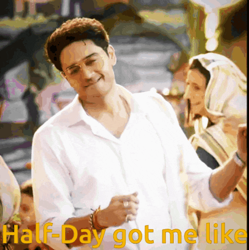 a man in a white shirt with the words half-day got me like