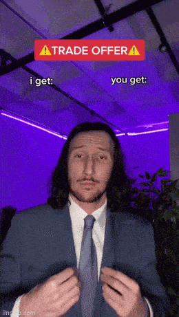 a man in a suit and tie is talking about a trade offer ..