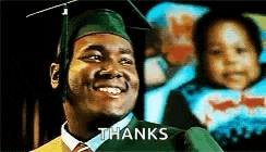 a man in a graduation cap and gown is smiling with the words `` thanks '' written on the bottom .