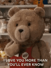 a teddy bear is holding a sign that says `` i love you more than you ll ever know '' .