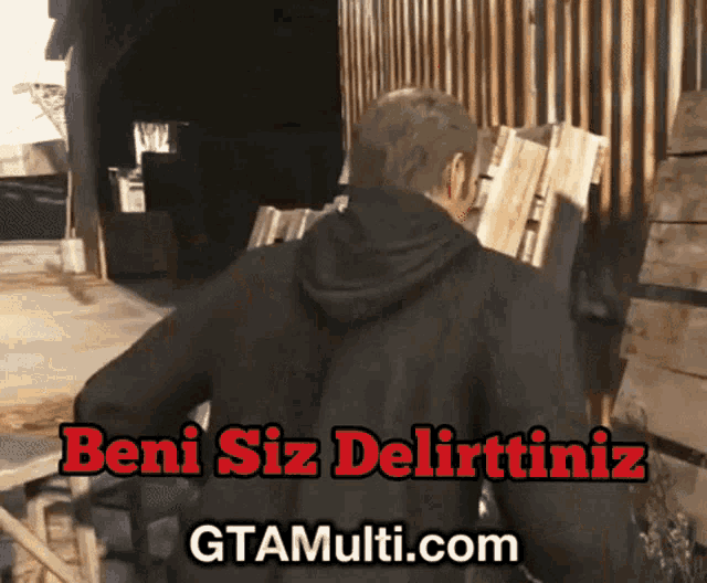 a man in a black jacket is standing in front of a fence with the words beni siz delirttiniz written on the bottom