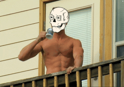 a shirtless man with a skull mask on his head drinking from a mug