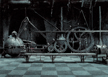 a black and white photo of a machine that looks like a chess board