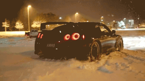 a car in the snow with a license plate that says ' e3mr '