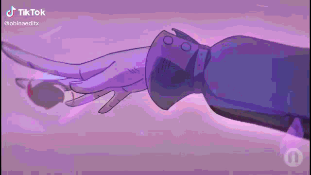 a person is holding another person 's hand with a purple background .
