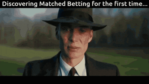 a man in a suit and hat with the words discovering matched betting for the first time written below him