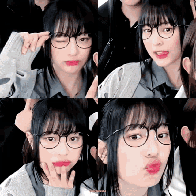 a girl wearing glasses makes a funny face with her tongue out