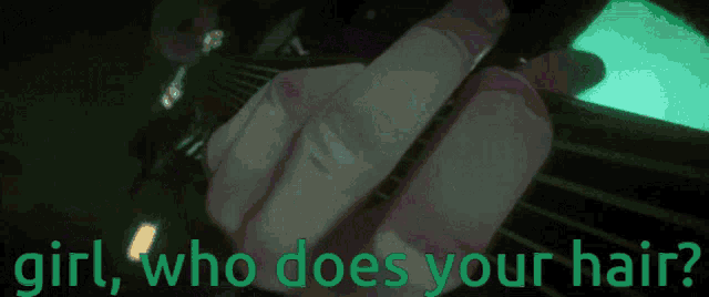 a person is playing a guitar with the words girl who does your hair