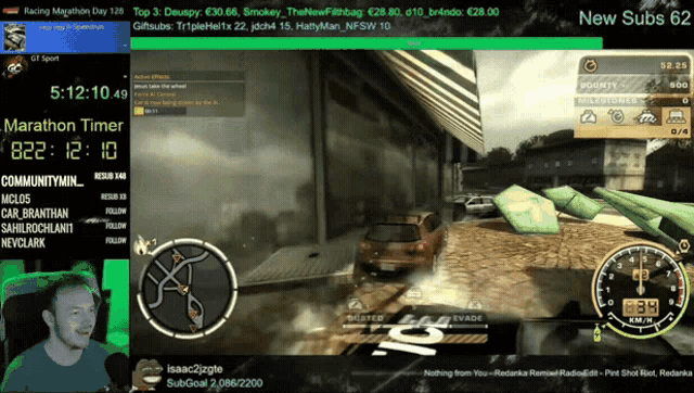 a man playing a video game with a marathon timer displayed