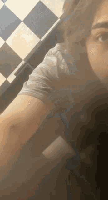 a person 's arm is visible in a blurry photo