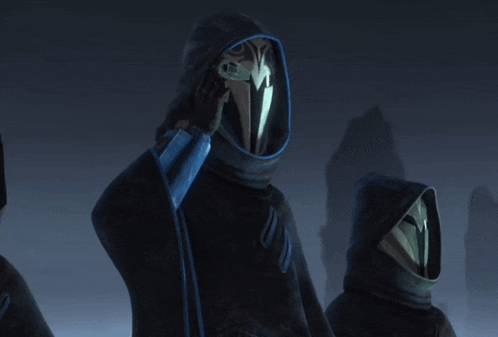 a group of hooded figures with the words " i 'm not sure " on the bottom